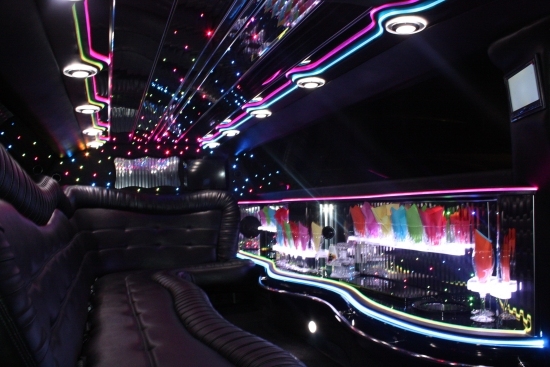 2011 Cadillac DTS 130 Inch Stretch Limousine Featuring Neon Lighting Effects and Gorgeous Black Leather